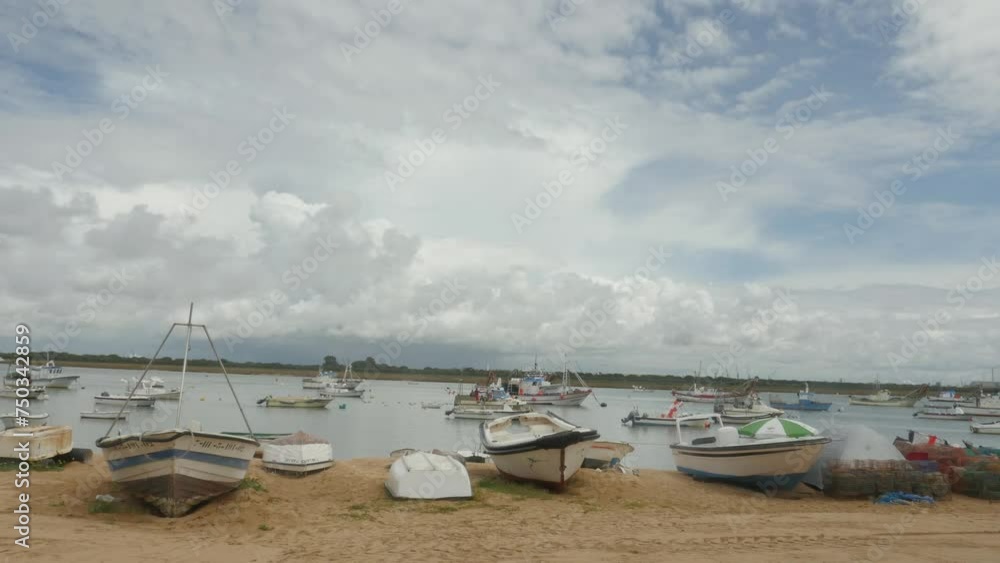 TIME LAPSE OF THE FISHING PORT OF PUNTA UMBRIA IN HUELVA IN ANDALUCIA TIME LAPSE OF THE FISHING PORT OF PUNTA UMBRIA IN HUELVA IN ANDALUCIA
