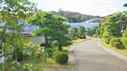 Japanese Garden in Toba Bay, Mikimoto Pearl Island on Warm Day photo