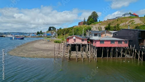 Drone Flyover Colorful Traditional Stilt Houses In Castro, Chiloe 4K