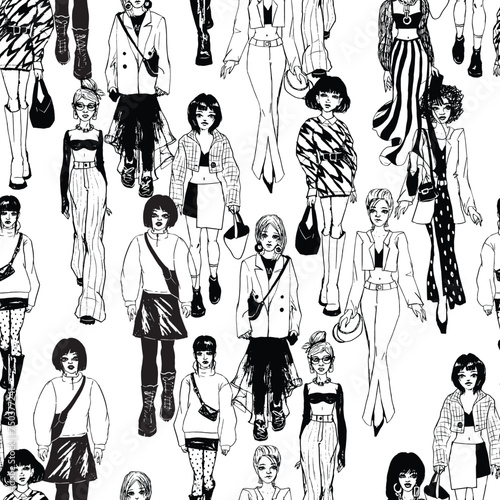 Seamless pattern. Women in trendy clothes. Defile sketch.