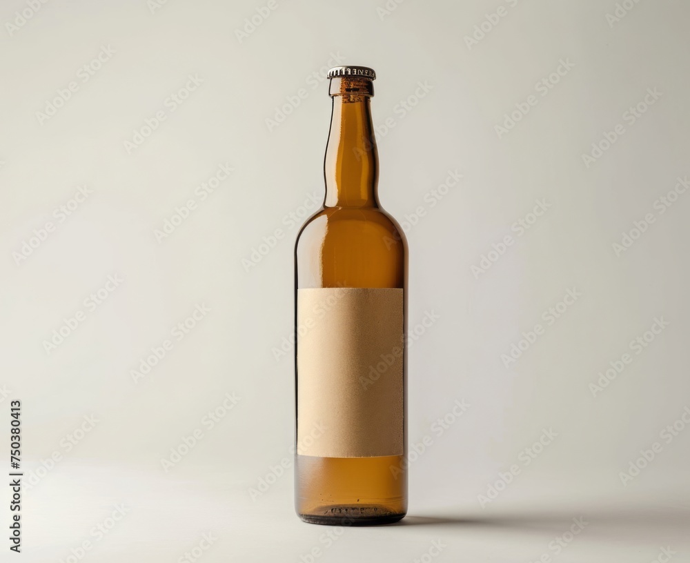 Displayed on a white background is a glass bottle with a brown label. Displayed on a white background is a glass bottle with a brown label.