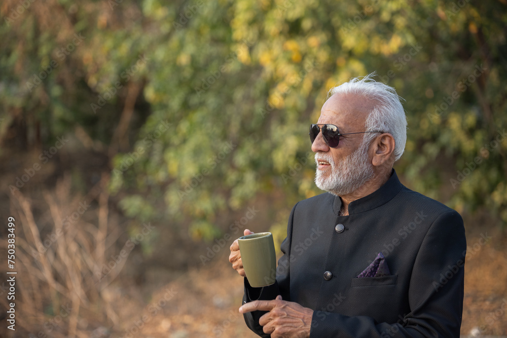 A senior businessman is having a coffee on his coffee break A senior businessman is having a coffee on his coffee break