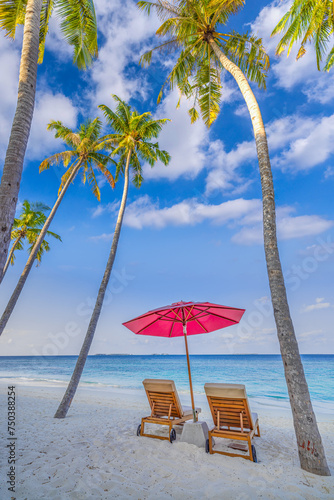 Beautiful coast sea sand sky. Tropical relax beach sunny summer island landscape. Love couple chairs umbrella palm leaves romantic coast. Luxury tourism destination. Honeymoon vacation best holiday