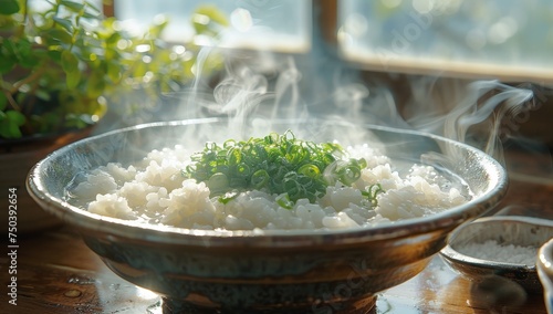 Cooking rice in a bowl with fresh herbs on a wooden table