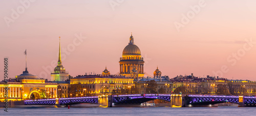 The dome of St Isaac's Cathedral in Saint Petersburg, Classical view of Neva river with Isaakievsky Cathedral in Saint-Petersburg, Russia