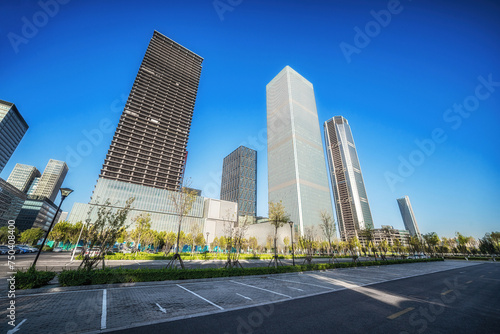 Reflection of Skyscrapers on Car in Urban Business Area © evening_tao