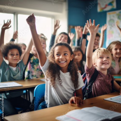 Cheerful Children Raising Hands in Classroom © Natalia Klenova