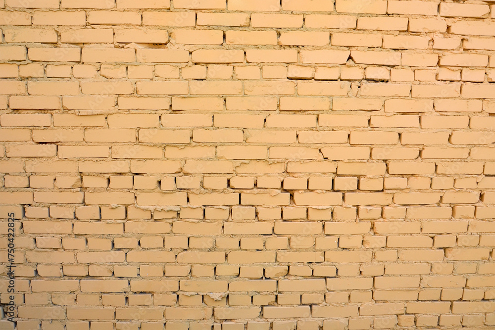 brick wall painted yellow background