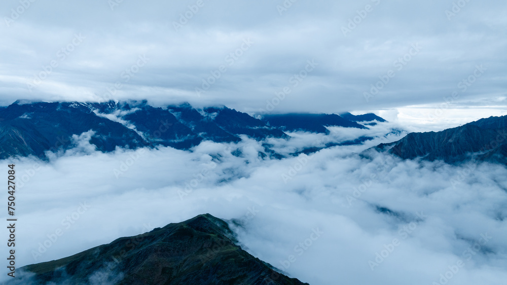 Beautiful foggy high altitude mountain landscape in China