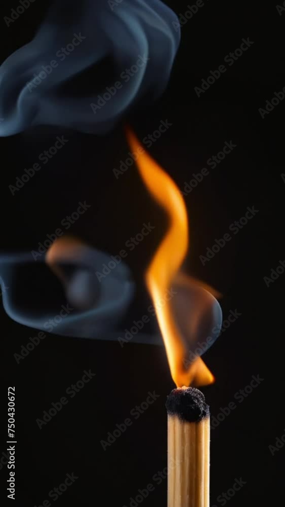 Super slow-motion shot of burning matchstick close-up on a black background. Super slow-motion shot of burning matchstick close-up on a black background.