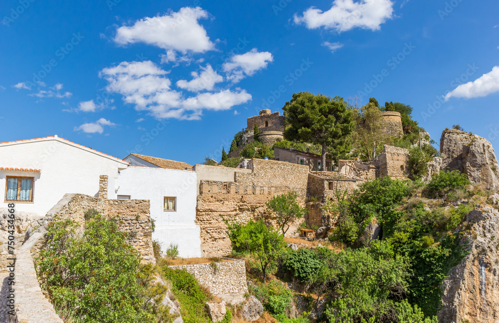 White houses and historic castle on top of the mountain in Guadalest, Spain
