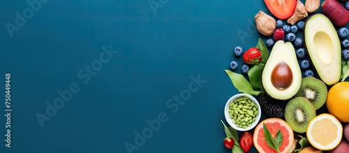 Nutritious Harvest: Fresh Produce Spread on a Vibrant Blue Background for Healthy Eating