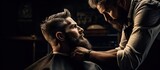 Barber Styling Man's Beard with Shearing Machine in Modern Hair Salon