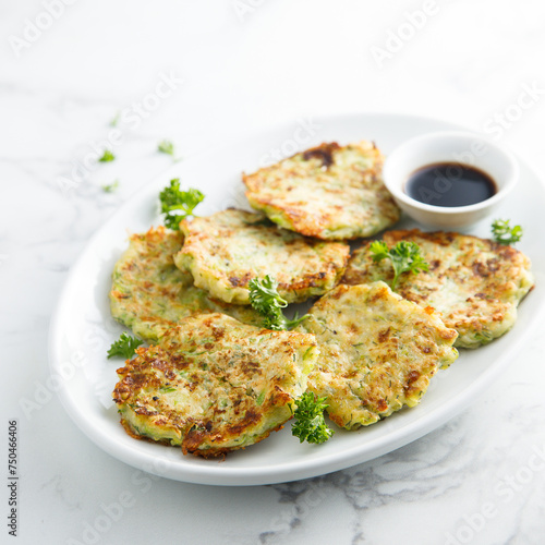 Homemade courgette latkes with herbs