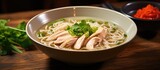 Delicious Chicken Noodles Soup Presentation with Colorful Vegetables in a Bowl