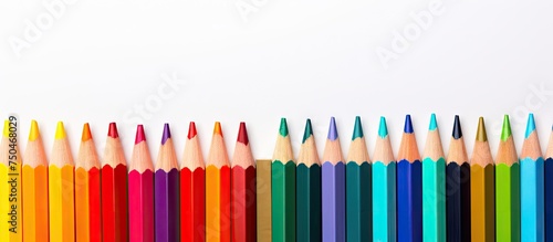 Vibrant Colored Pencils Aligned in Rainbow Order for Creative Art Projects