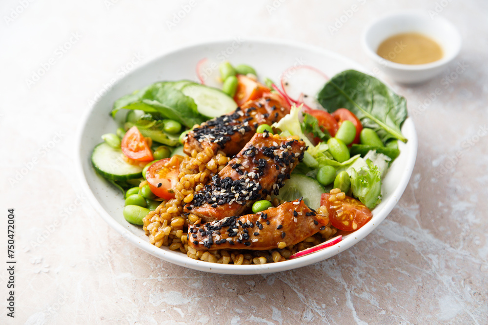 Salmon poke with vegetables and sesame seeds Salmon poke with vegetables and sesame seeds