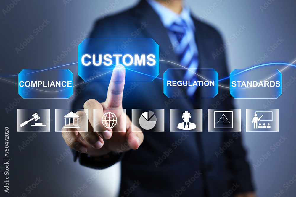 Customs officers point fingers at the word Customs to remind them to declare goods or pay taxes on foreign imports in order to comply with the law Customs officers point fingers at the word Customs to remind them to declare goods or pay taxes on foreign imports in order to comply with the law