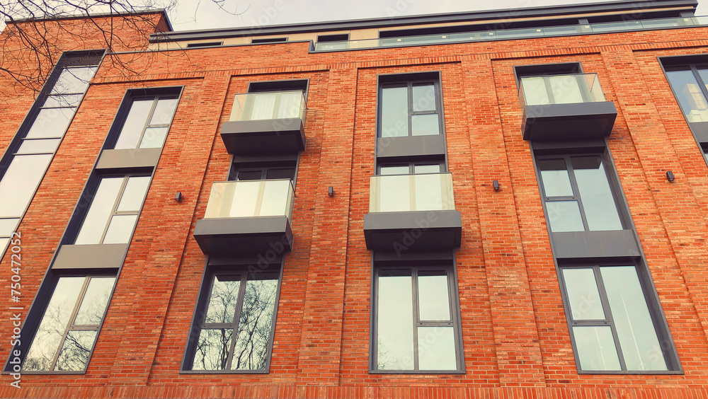 Obraz premium Architecture and real estate, modern residential apartment building with large panoramic windows