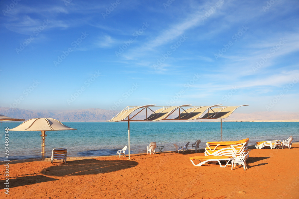  Dead Sea, the orange sand and beach chairs