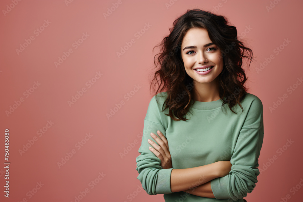 Fototapeta premium Smiling Brunette Woman in Casual Green Attire Against Pink Background. Generative AI