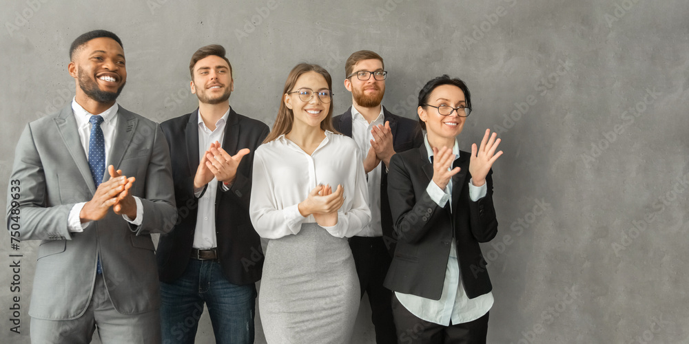 © Prostock-studio - Grateful listeners. Happy business team applauding after seminar