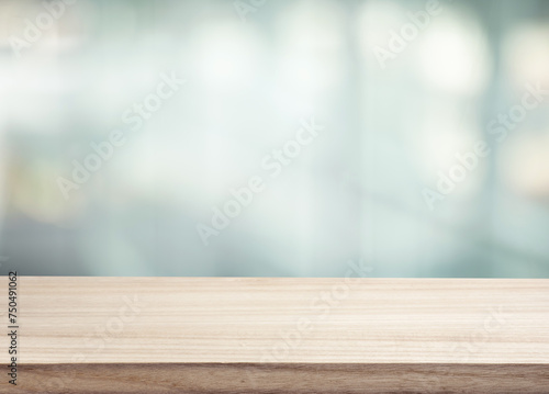 Selective focus.Top of wood  table with window glass background