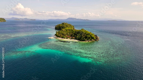 Aereal view of a beautiful remote paradise island off the coast of Surigao, the Philippines