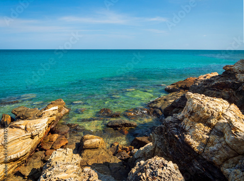 Beautiful horizon landscape view point tropical summer rock sea ocean white beach blue sky blackground nature calm wave water. wind blows cool clear look relaxed travel Thailand sun day time .