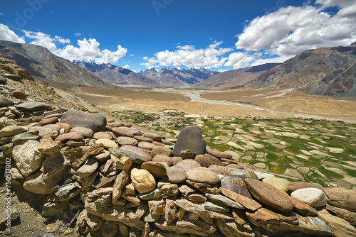 Panoramic view at the Zanskar valley with mani stones at the front view