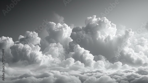 A dramatic monochromatic portrayal of towering cumulus clouds, evoking a sense of power and tranquility in a vast sky.