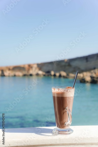 chocolate shake and coffee on the beach. Refreshment in summer holidays