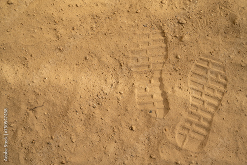 Footprint in the sand from shoes