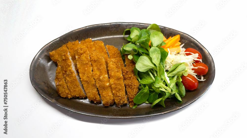 Tonkatsu or deep fried pork, a traditional Japanese dish Tonkatsu or deep fried pork, a traditional Japanese dish