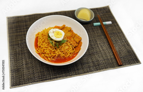 Korean instant noodles with fish cake and boiled egg - Rabokki korean food photo