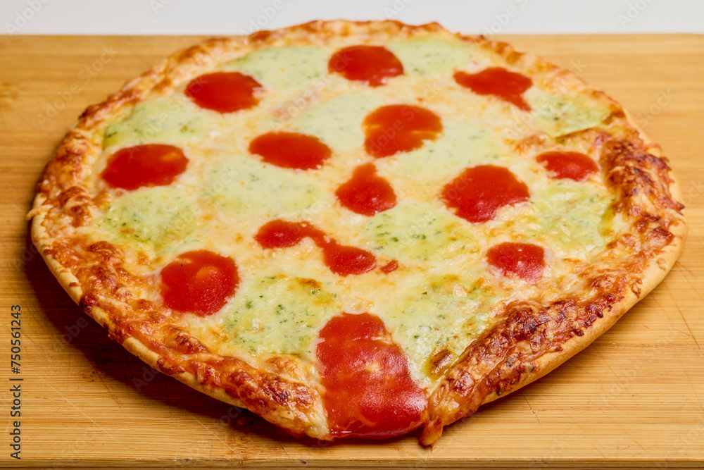 pizza cooked on a wooden board pizza cooked on a wooden board