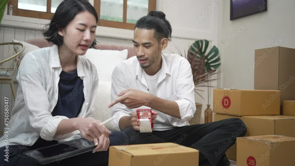 Young couple packing products and send to customers. Young couple packing products and send to customers.