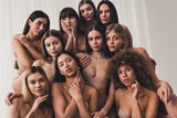 Photo of group different caucasian women support body positive concept wear beige lingerie over white wall background