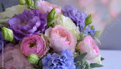 spring flower bouquet; rose, eustoma, hydrangea, lavender in pink, purple and white colors. Copy space for your text