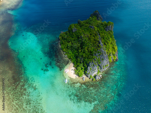 Top view of Bukal Island with turquoise clear water and beach. El Nido, Palawan. Philippines.