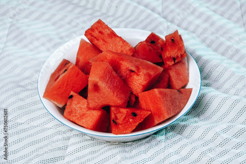 Sliced watermelon in a bowl. Fruit before eating.