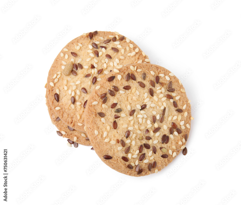 Round cereal crackers with flax, sunflower and sesame seeds isolated on white, top view Round cereal crackers with flax, sunflower and sesame seeds isolated on white, top view