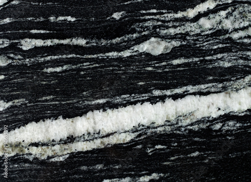 Black marble texture with abstract white line structure, black granite background