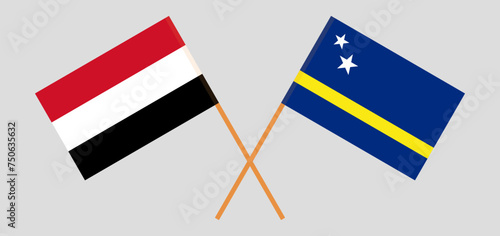 Crossed flags of Yemen and Country of Curacao. Official colors. Correct proportion