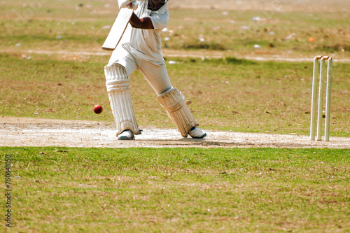 cricket batsman is playing cover drive