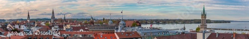 Huge panoramic view over the city Constance (Konstanz) by Lake Constance (Bodensee). The Imperia statue, the towers of church St. Stephan, Constance Cathedral and the train station can be seen.