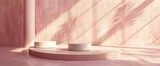 Minimalistic product display scene with soft pink hues, casting serene shadows on a textured floor, featuring a potted palm and cylindrical podiums.