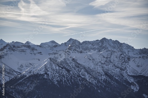 Drone shots at Herzogstand in Bavaria near the Alps  with snow-covered mountains  lakes and landscapes in the background