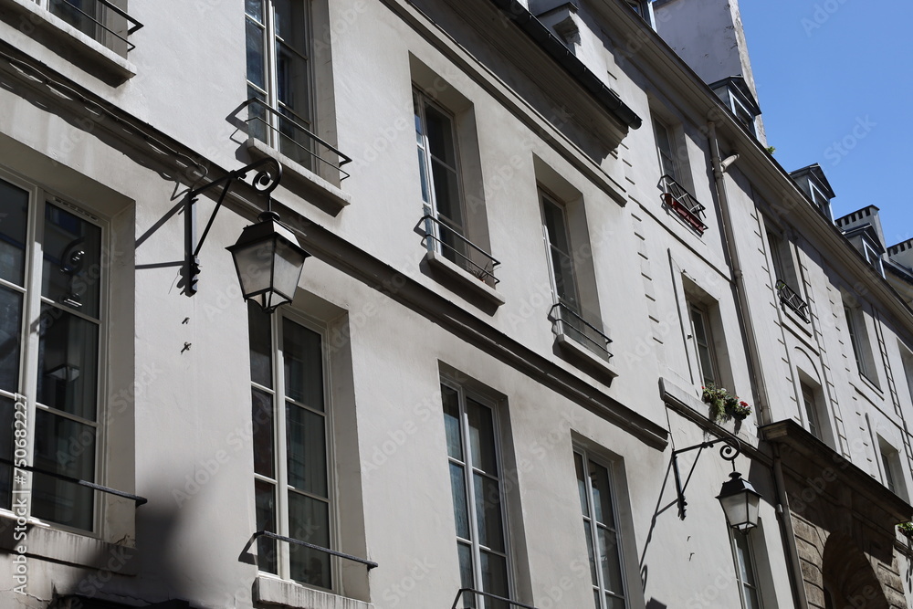 Naklejka premium typical facade from Paris , real estate and residential building