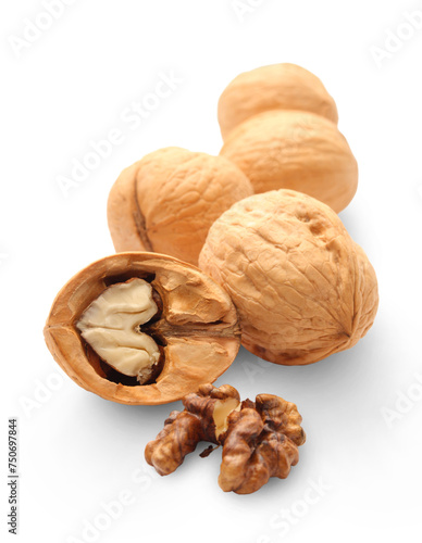 Heap of walnuts on white